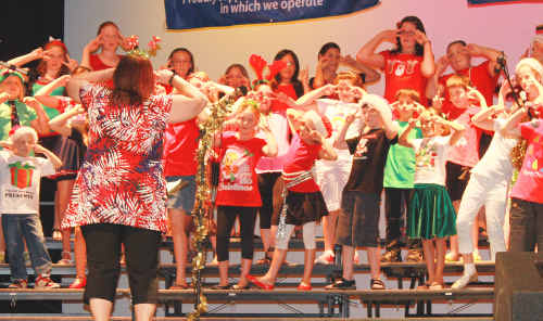 CHRISTMAS CHEER: The carols sung by the children were sweet. ad-041210-198 CHRISTMAS CHEER: The carols sung by the children were sweet. ad-041210-198